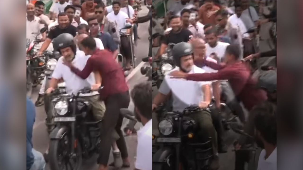 রাহুল গান্ধীকে চুমু দিয়ে মার খেলেন সমর্থক